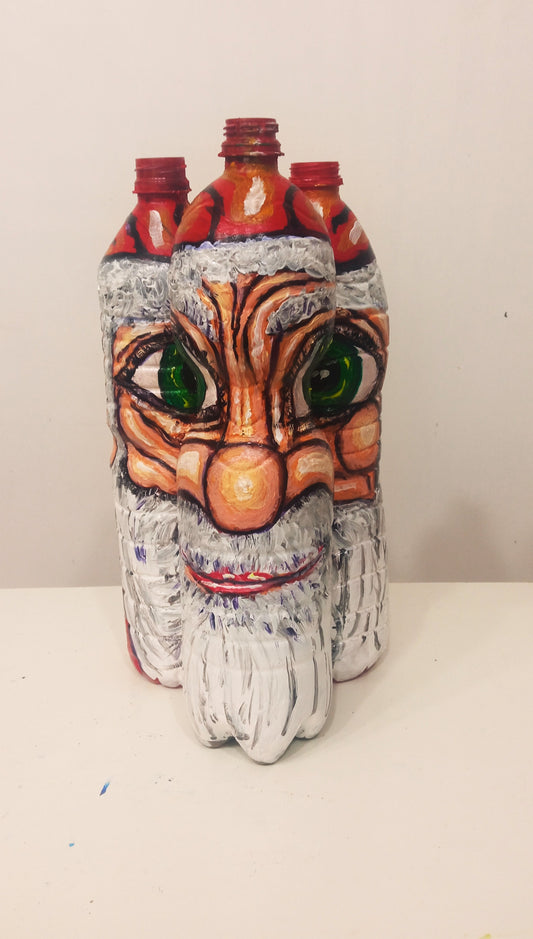 Santa Claus Christmas Figurine Created out of Three Recycled  Plastic Bottles . [Recycled Art]. Ivan Fyodorovich. Front view