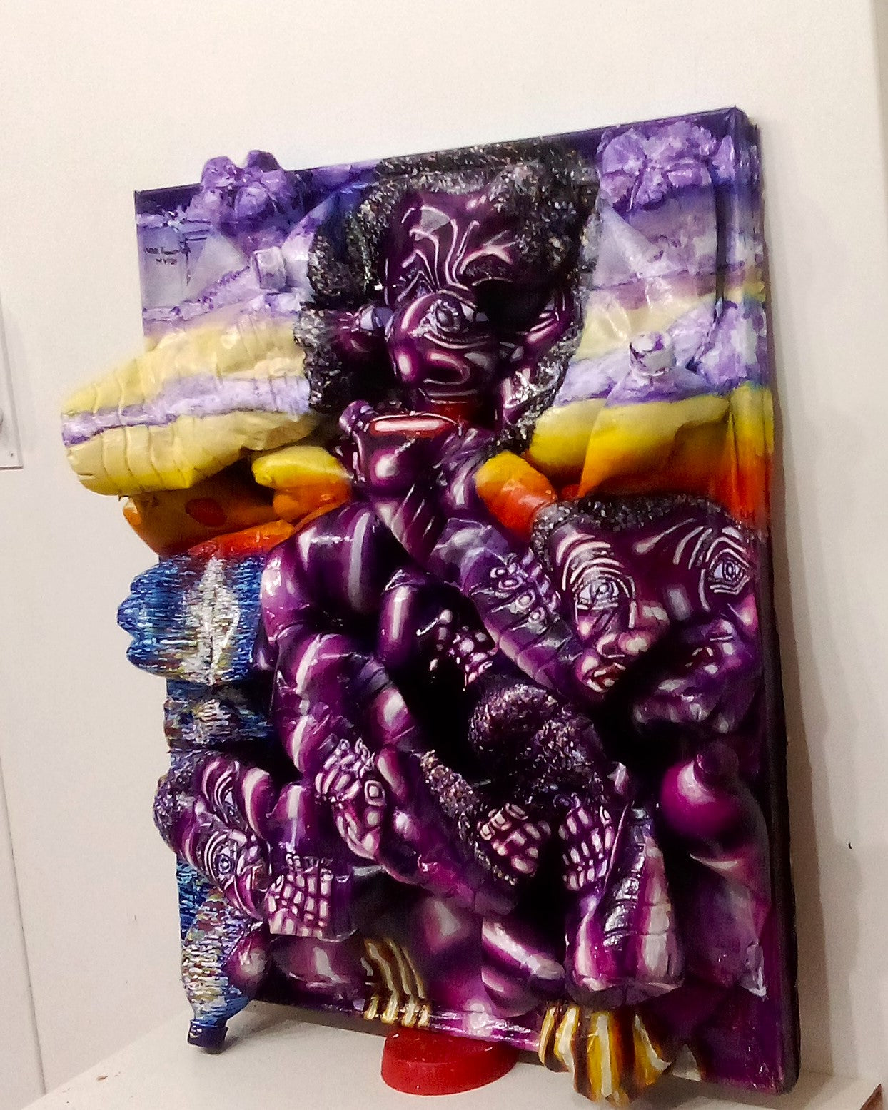  3d Portrait of a Black Migrant Woman with 3 Children. Acrylic on Cardboard and Recycled Plastic Bottles. [Recycled Art]. Ivan Fyodorovich. Medium right lateral view