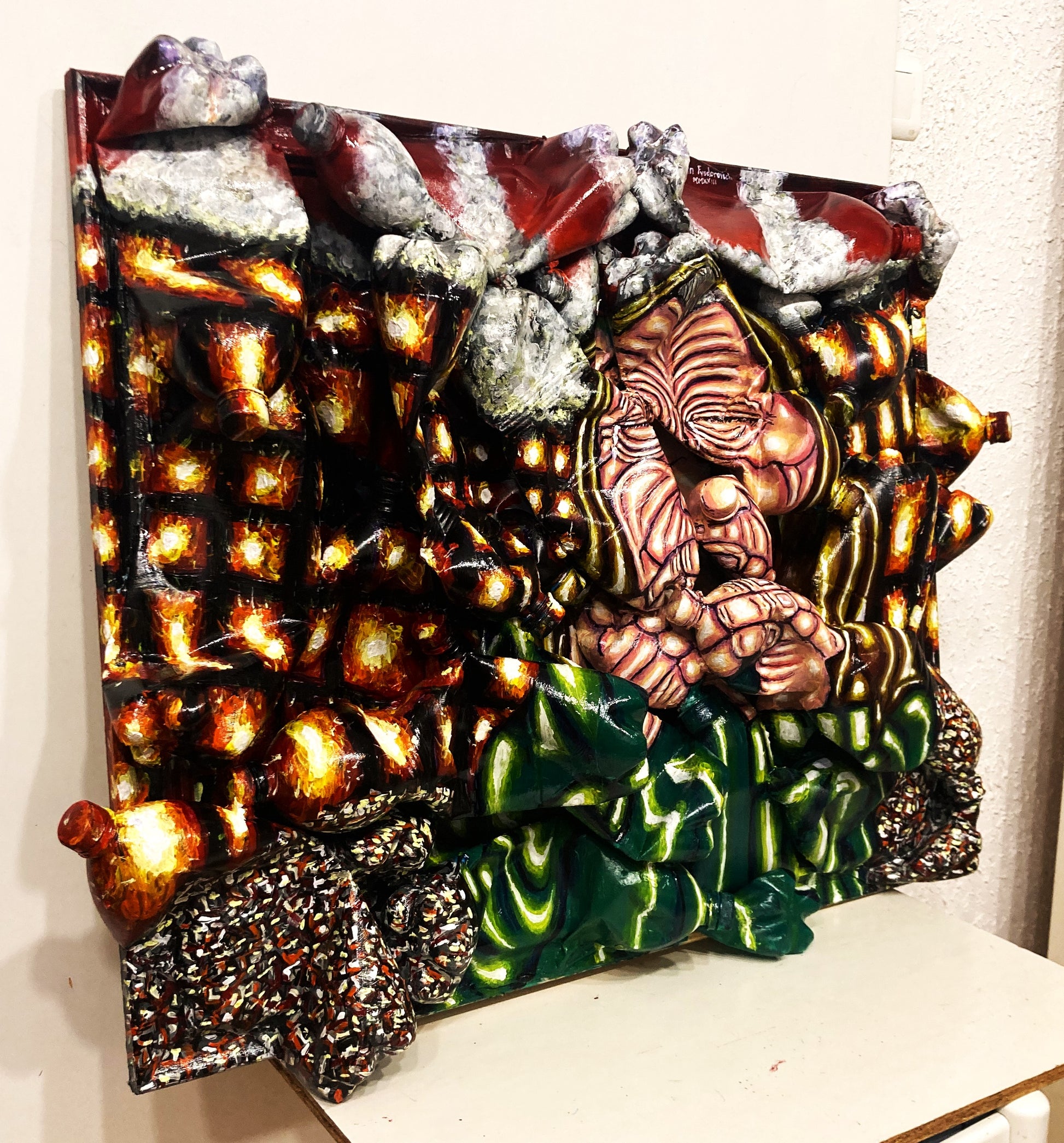 3d Portrait of an Ukrainian Old Woman in front of a Burning City. Acrylic on Cardboard and Recycled Plastic Bottles [Recycled Art]. Ivan Fyodorovich. Medium left side view