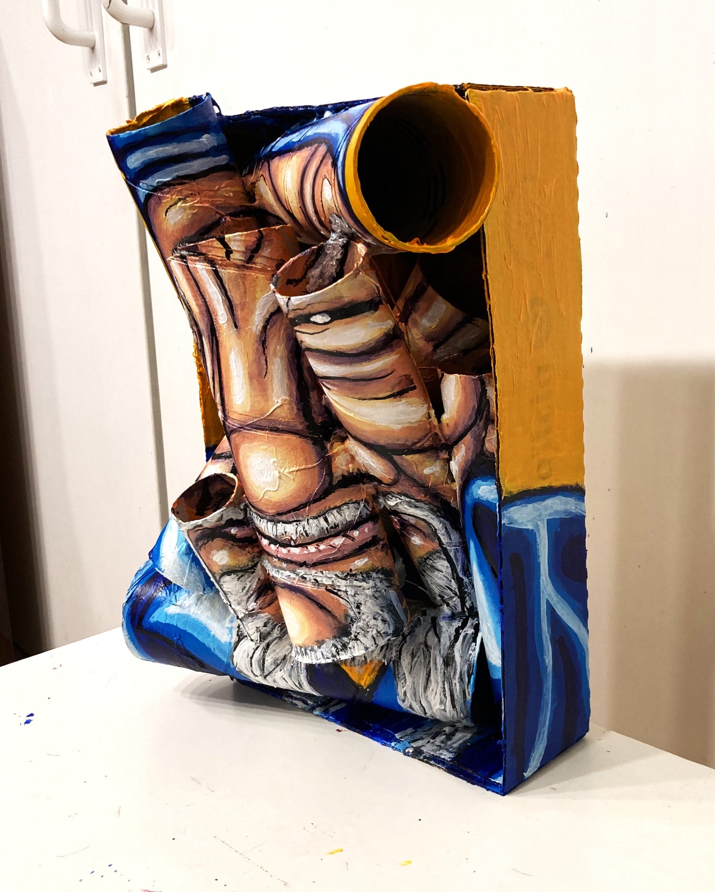 Portrait of an Old Uigur Man. Acrylic on Recycled Cardboard Tubes. Wall Decoration. Medium Right Lateral View