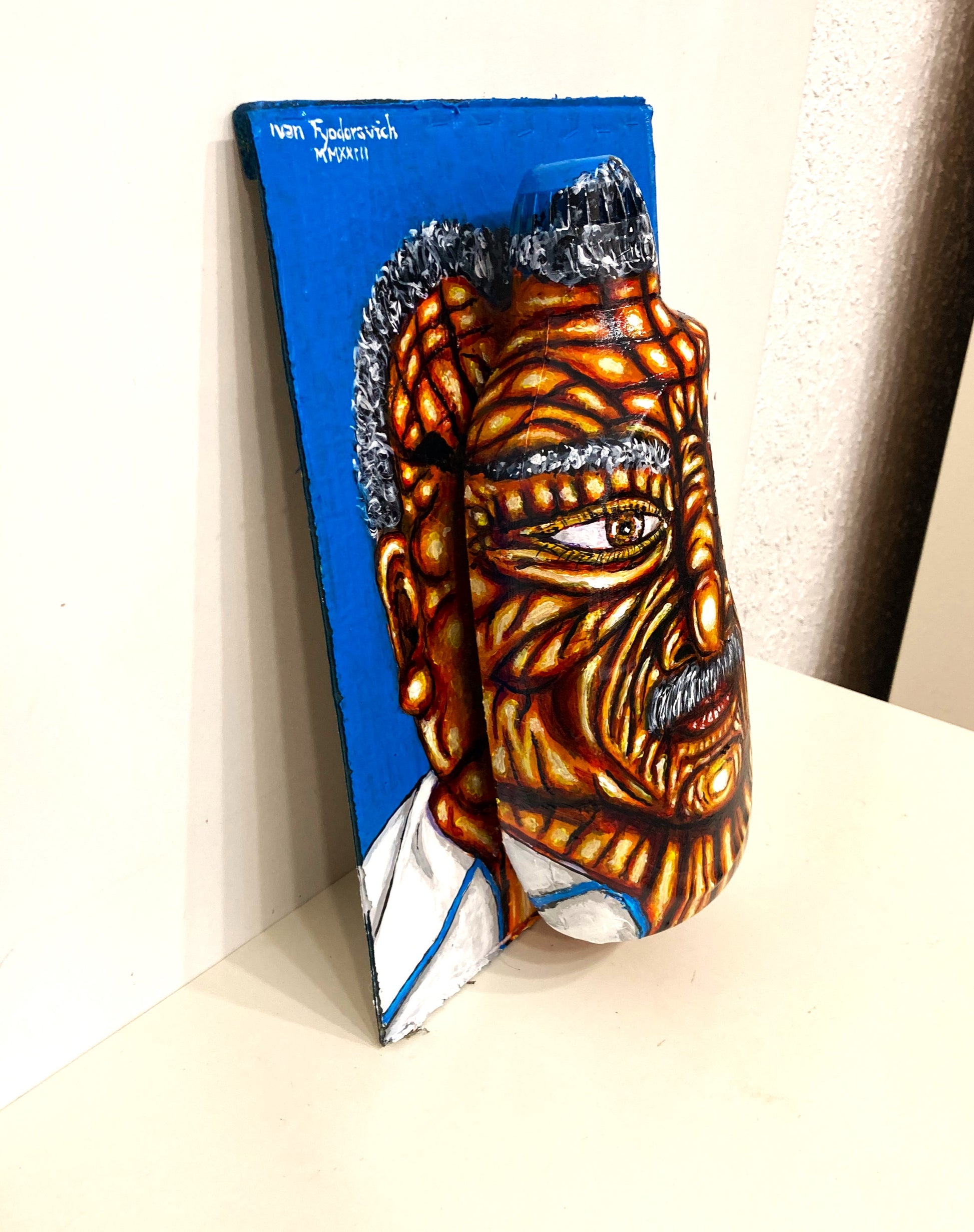 3D Portrait of an Old Man from Costa Rica. Acrylic Painting on Cardboard and Recycled Washing Liquid Plastic Bottle.Llateral right view