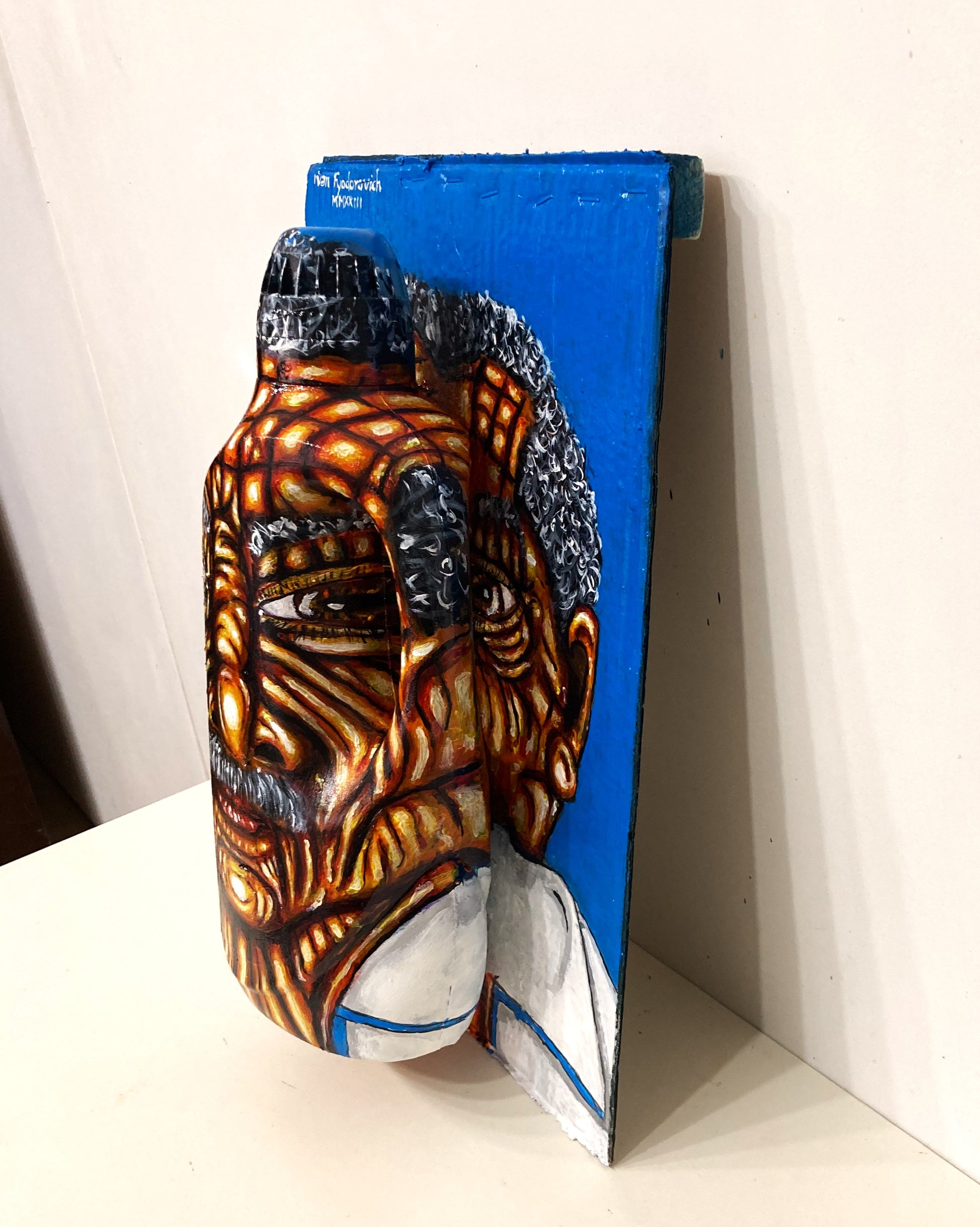 3D Portrait of an Old Man from Costa Rica. Acrylic Painting on Cardboard and Recycled Washing Liquid Plastic Bottle. Lateral left  view