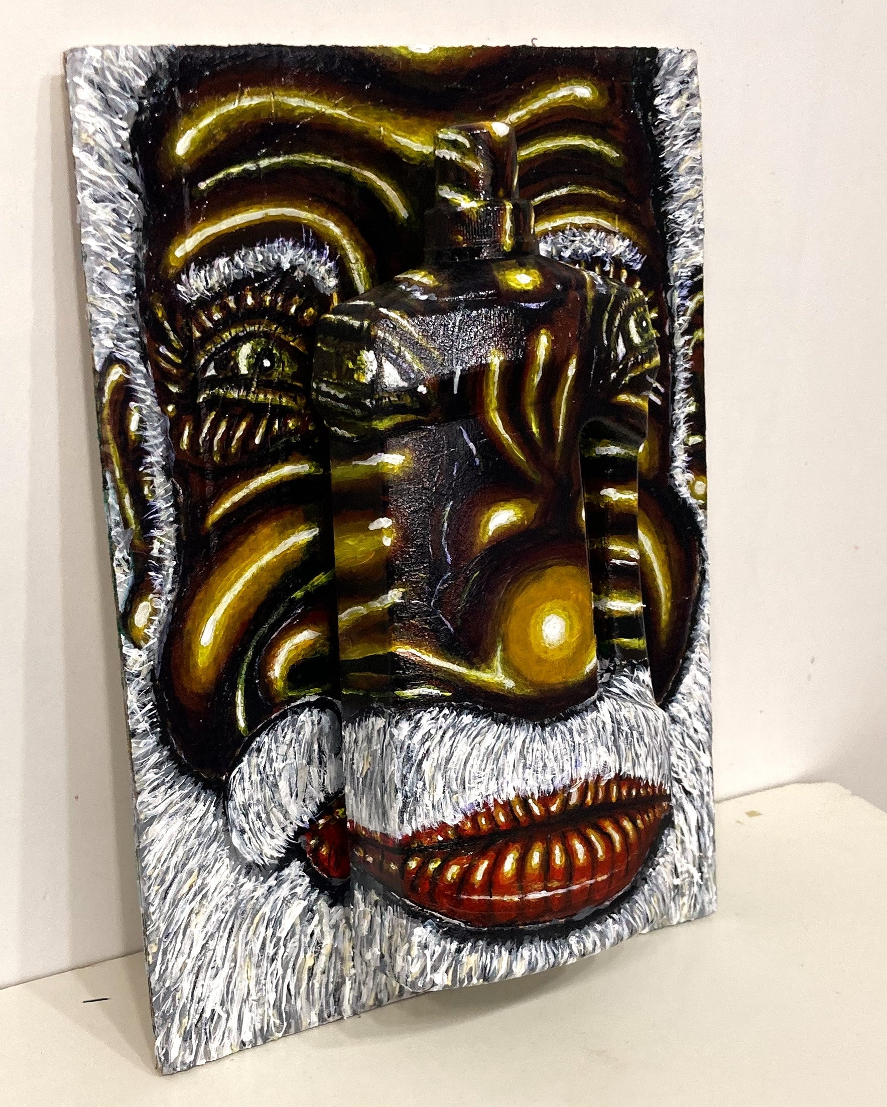 3D Portrait of an Old Australian Aboriginal Man. Acrylic Painting on Cardboard and Recycled Washing Liquid Plastic Bottle. Medium Left Lateral View