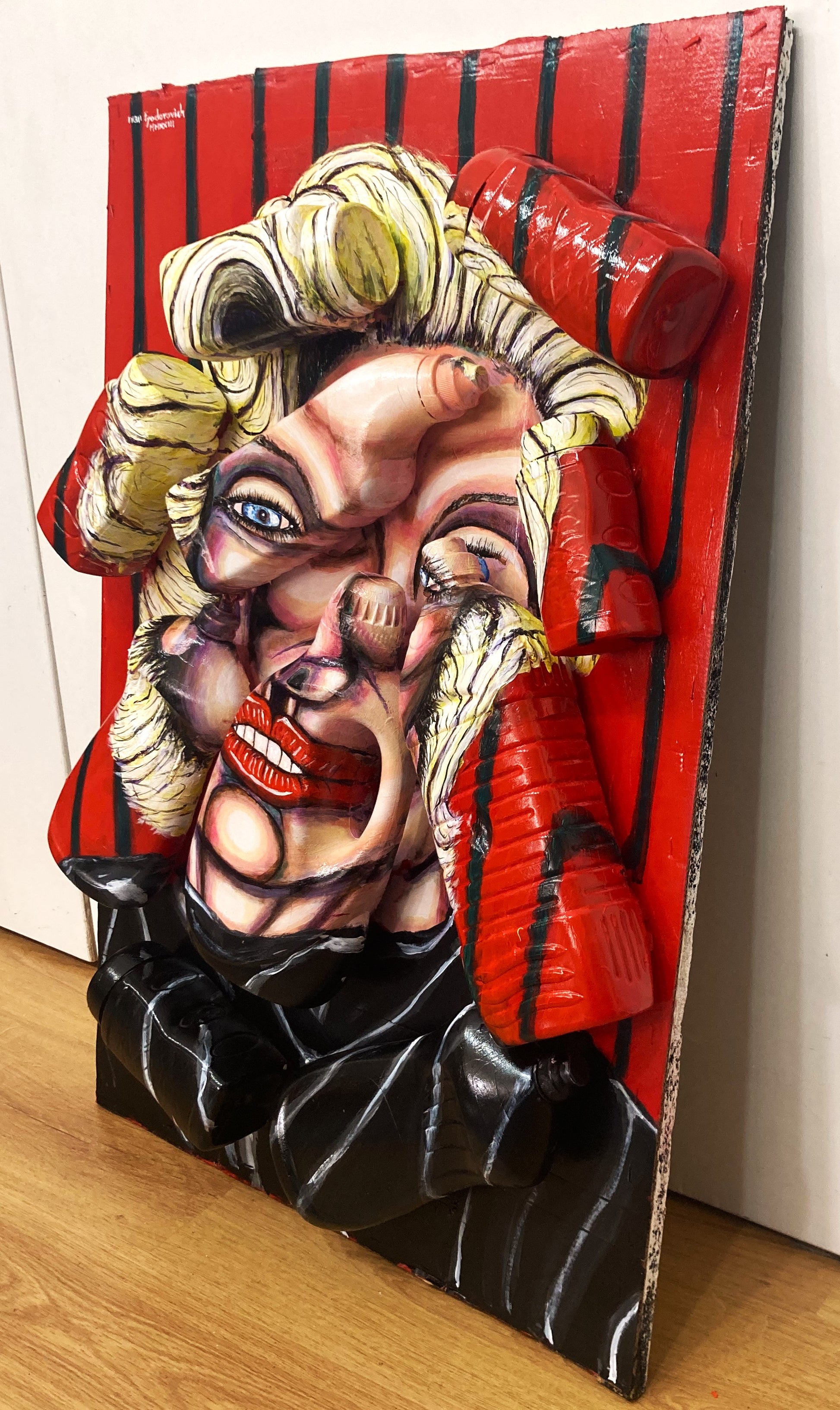 3D Portrait of Marilyn Monroe. Acrylic Painting  on Cardboard and various washing products plastic bottles [Recycled Art]. Ivan Fyodorovich. Medium lateral right view