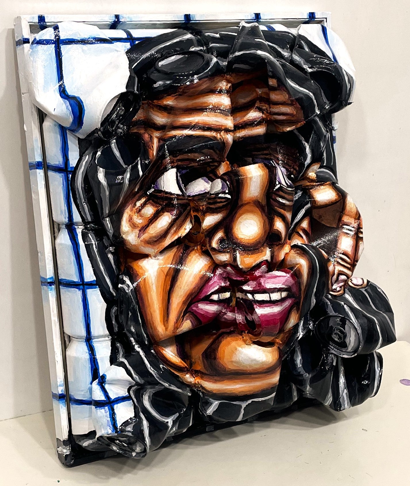 3D Portrait of a Gaza Woman With Pointing Finger. Acrylic Painting on Recycled Beer Cans [Recycled Art]. Ivan Fyodorovich. Mediun lateral right view