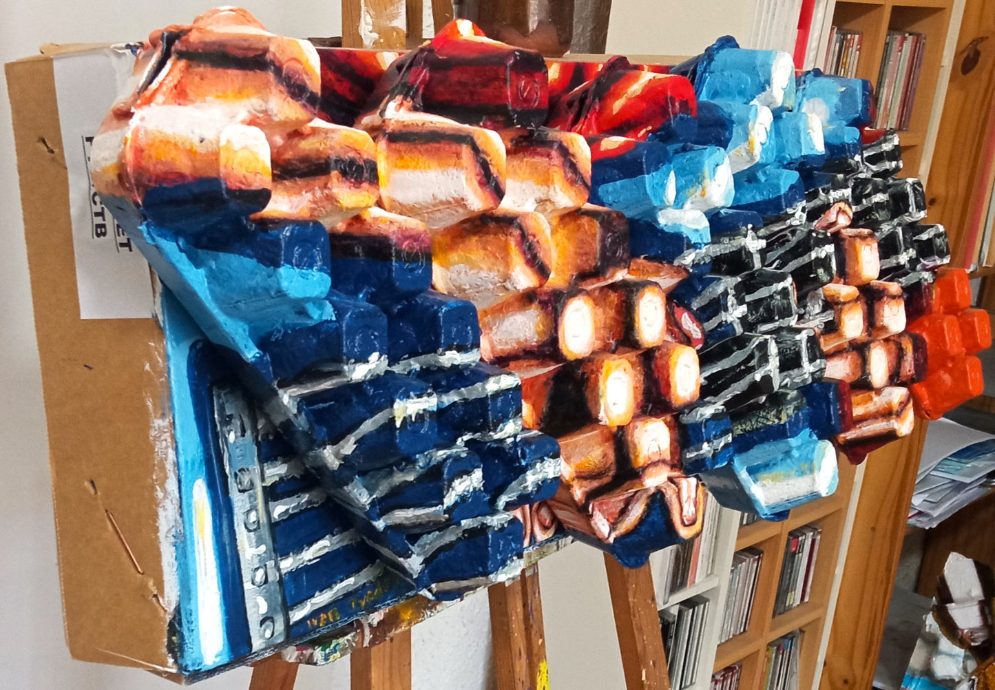 3D close-up of hands playing bass guitar. Acrylic paint on recycled cardboard and recycled egg cartons. (Music Art) [Recycled Art]. Left Lateral vuew