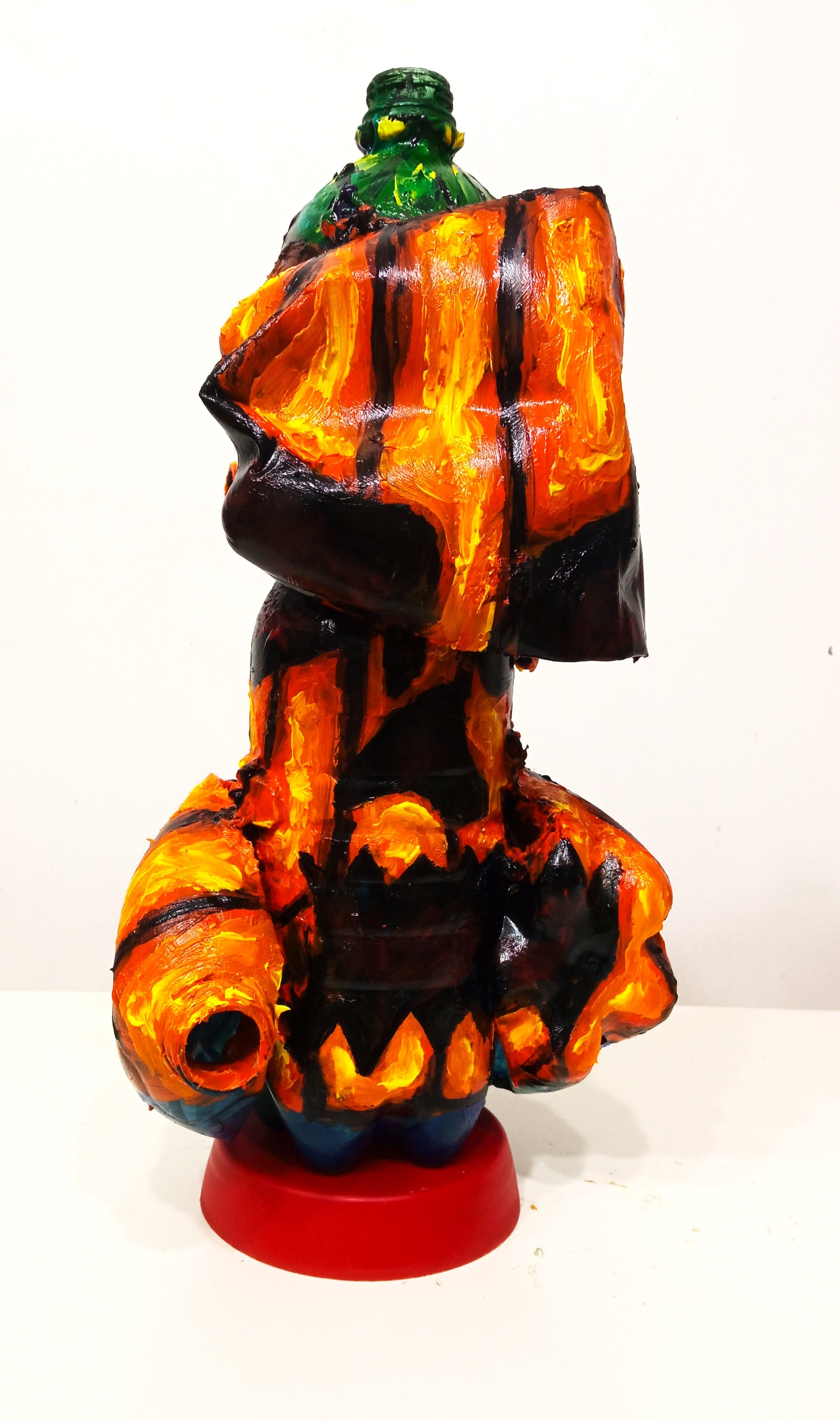 Crushed Halloween Pumpkin Figurine Created out of Recycled Plastic Bottles . [Recycled Art]. Ivan Fyodorovich. Front view