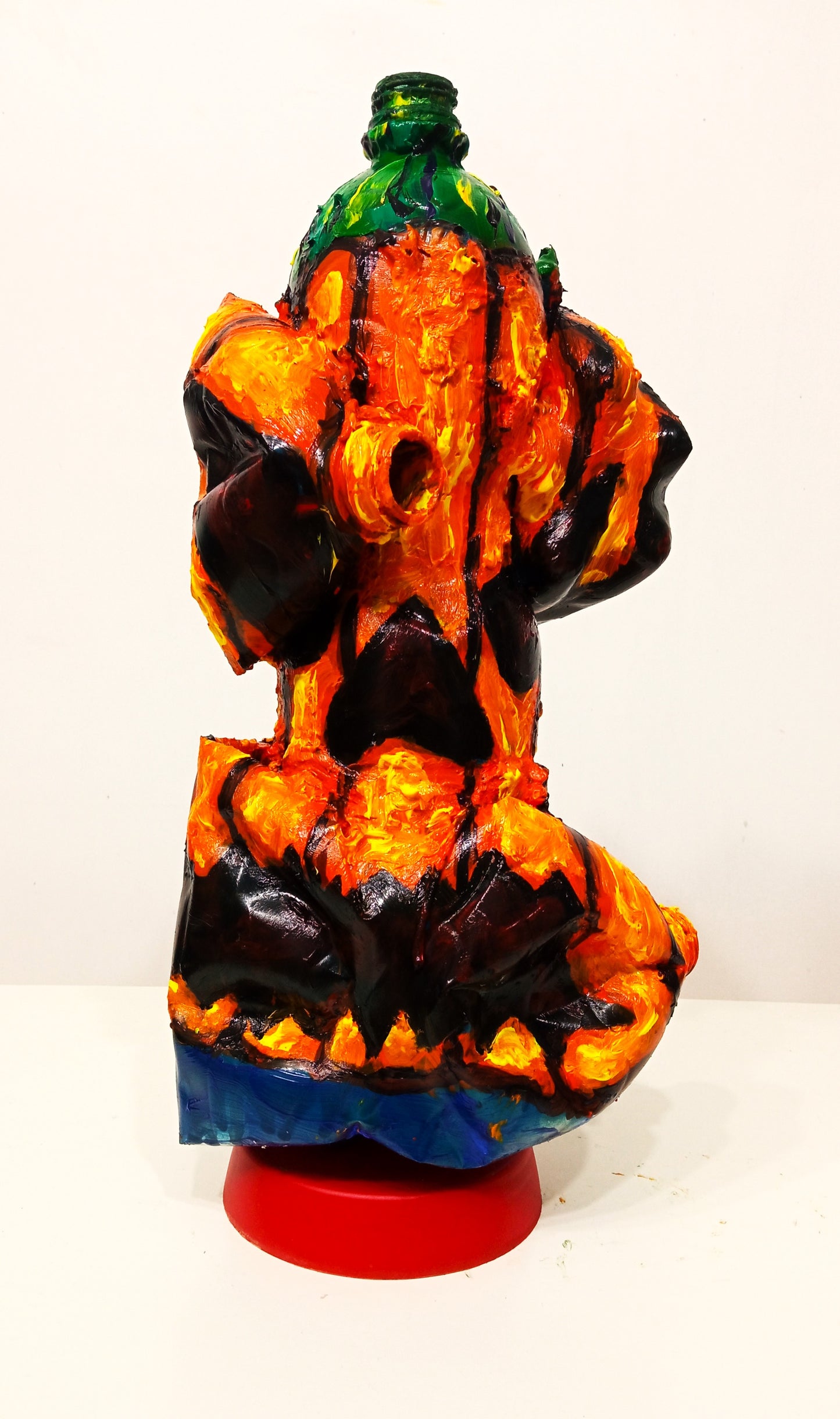 Crushed Halloween Pumpkin Figurine Created out of Recycled Plastic Bottles . [Recycled Art]. Ivan Fyodorovich. Back view