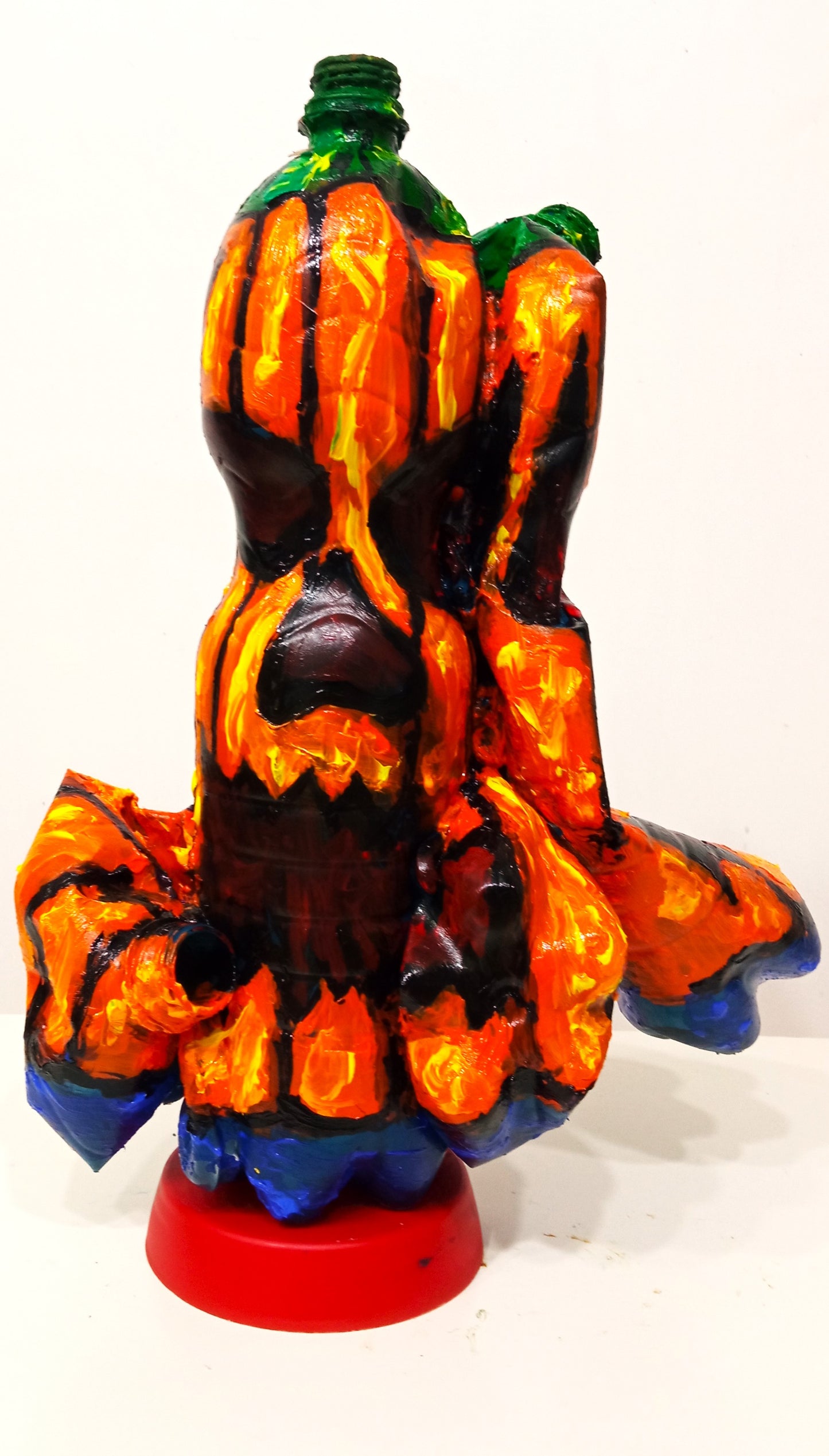 Drammatic Halloween Pumpkin Figurine Created out of Recycled Plastic Bottles . [Recycled Art]. Ivan Fyodorovich. Front view