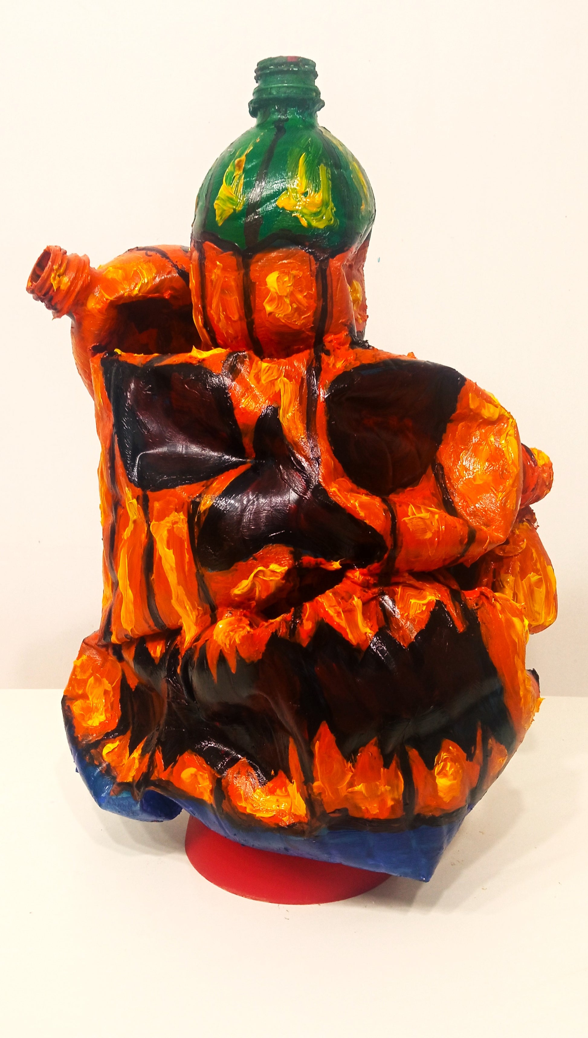 Grotesque Halloween Pumpkin Figurine Created out of Recycled Plastic Bottles . [Recycled Art]. Ivan Fyodorovich. Front view