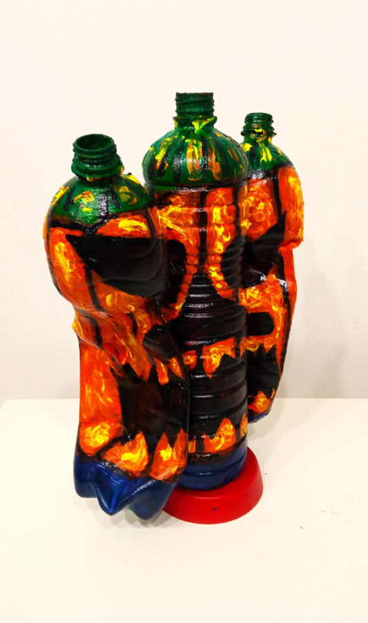 Triple Halloween Pumpkin Figurine Vase Created out of Recycled Plastic Bottles . [Recycled Art]. Ivan Fyodorovich. Front view