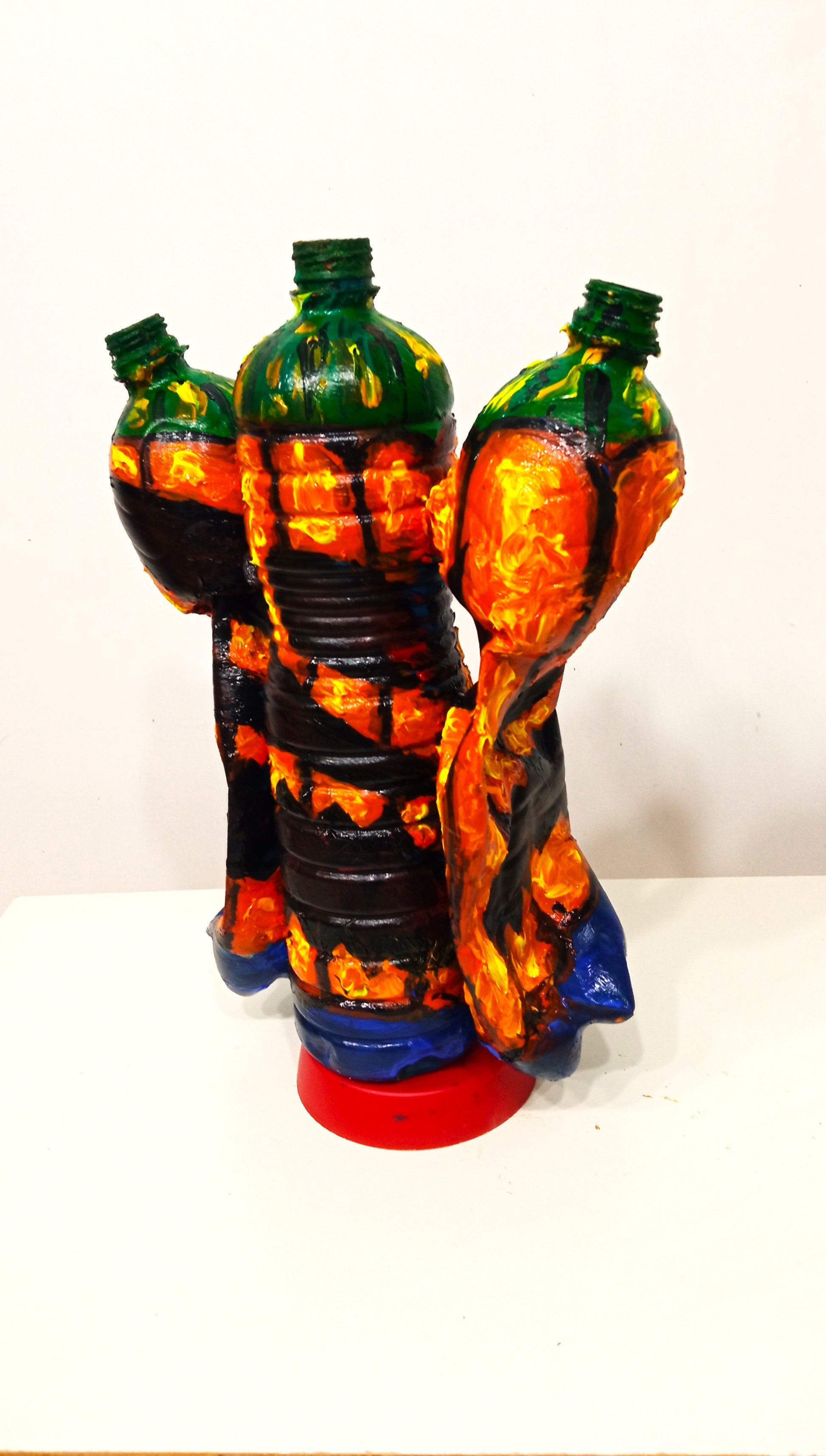 Triple Halloween Pumpkin Figurine Vase Created out of Recycled Plastic Bottles . [Recycled Art]. Ivan Fyodorovich. Right lateral view