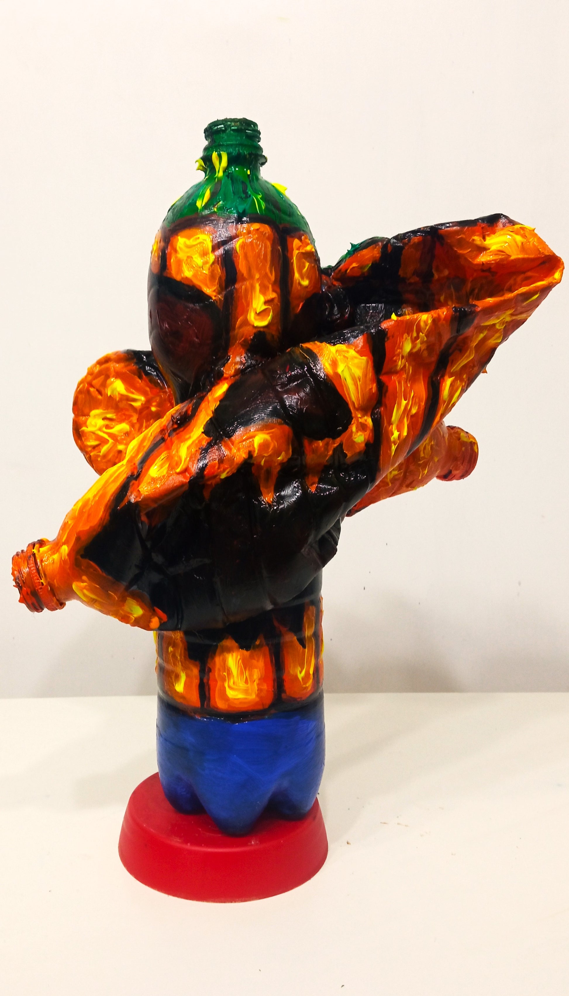 Big Mouthed Halloween Pumpkin Figurine Vase Created out of Recycled Plastic Bottles . [Recycled Art]. Ivan Fyodorovich. Front view