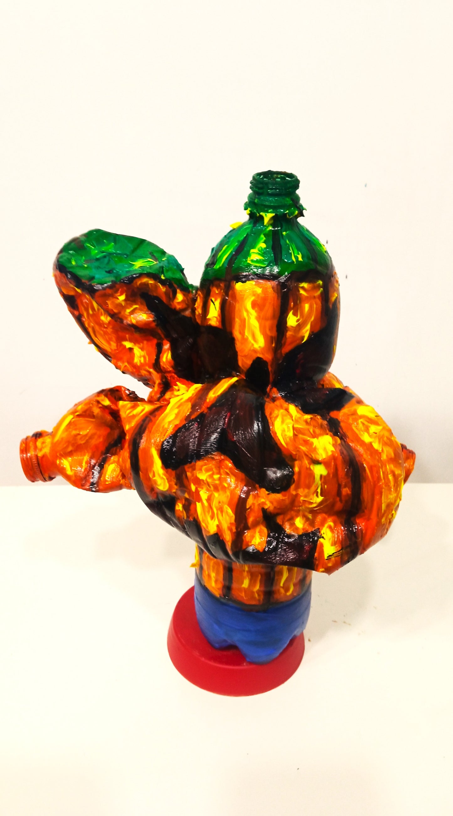 Big Mouthed Halloween Pumpkin Figurine Vase Created out of Recycled Plastic Bottles . [Recycled Art]. Ivan Fyodorovich. Back view