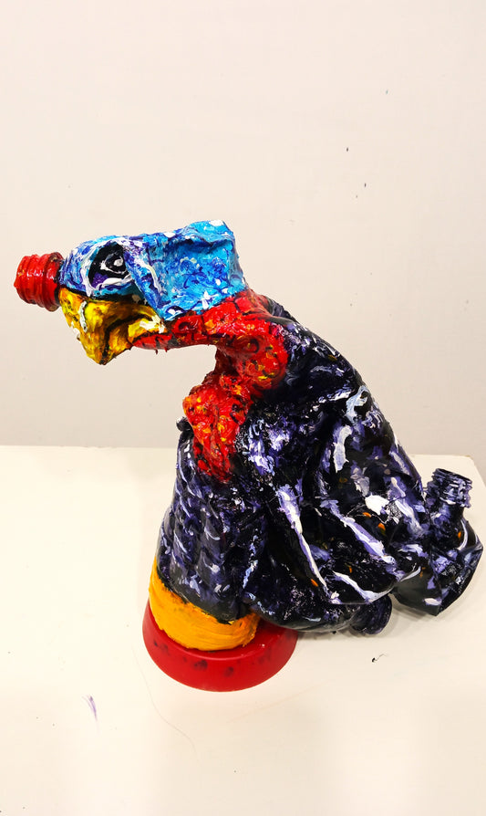 Acrylic painted Recycled plastic bottles Angry Turkey Figurine. Table top . Left side