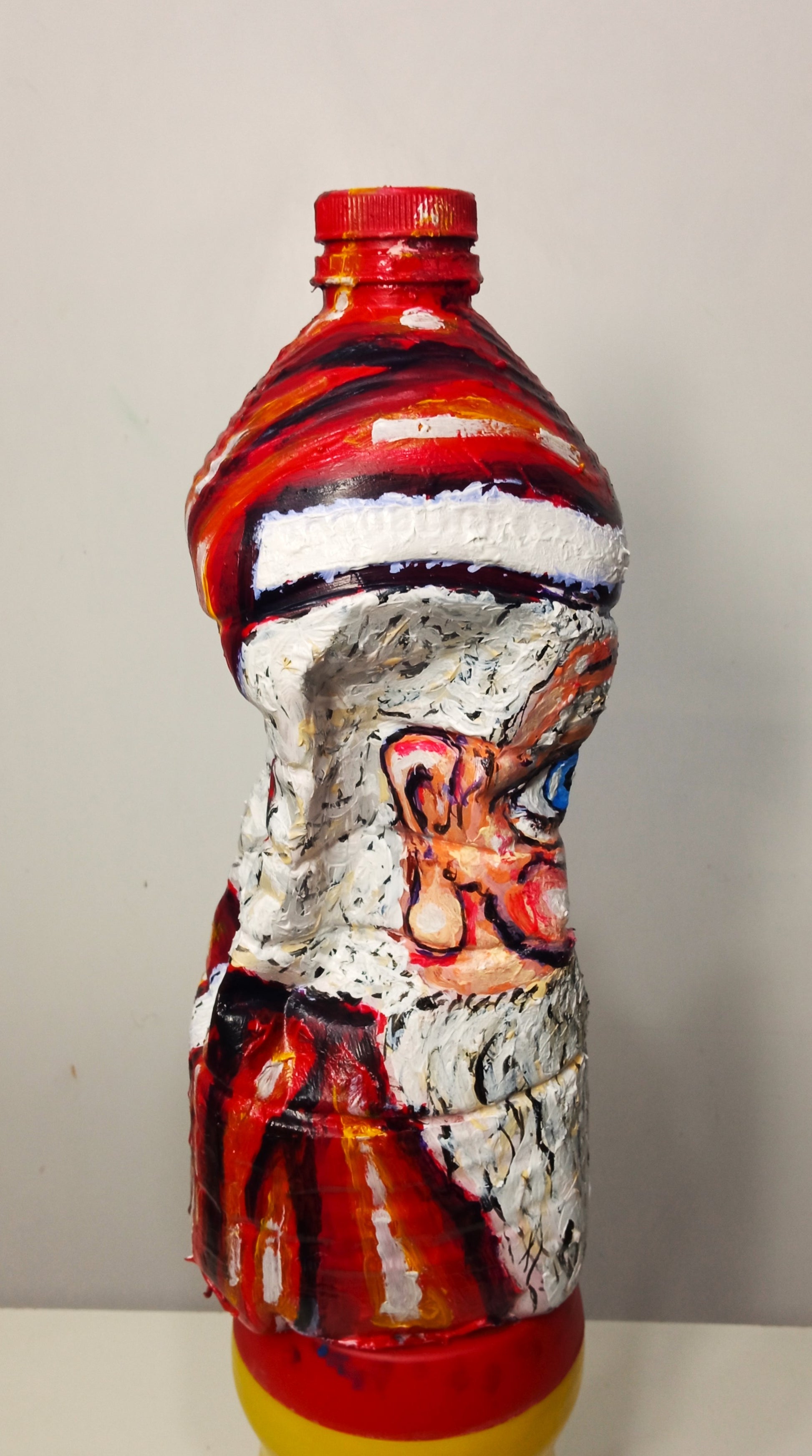 Blue Eyed Santa Claus  Face Figurine Created out of Recycled Plastic Bottle. [Recycled Art]. Ivan Fyodorovich.Left side view