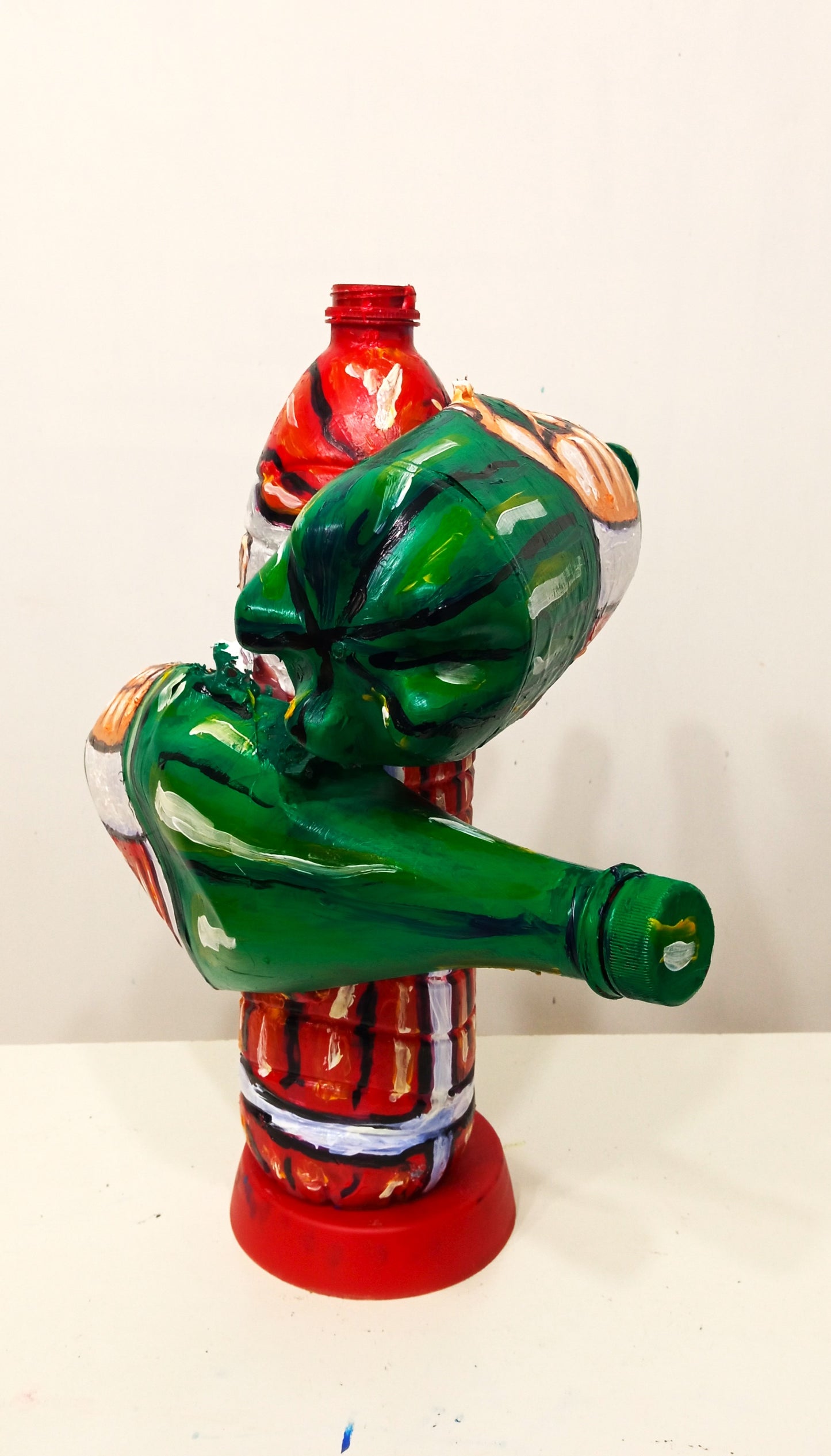 Grumpy Santa Claus Figurine Created out of Recycled Plastic Bottles . [Recycled Art]. Ivan Fyodorovich. Back side view