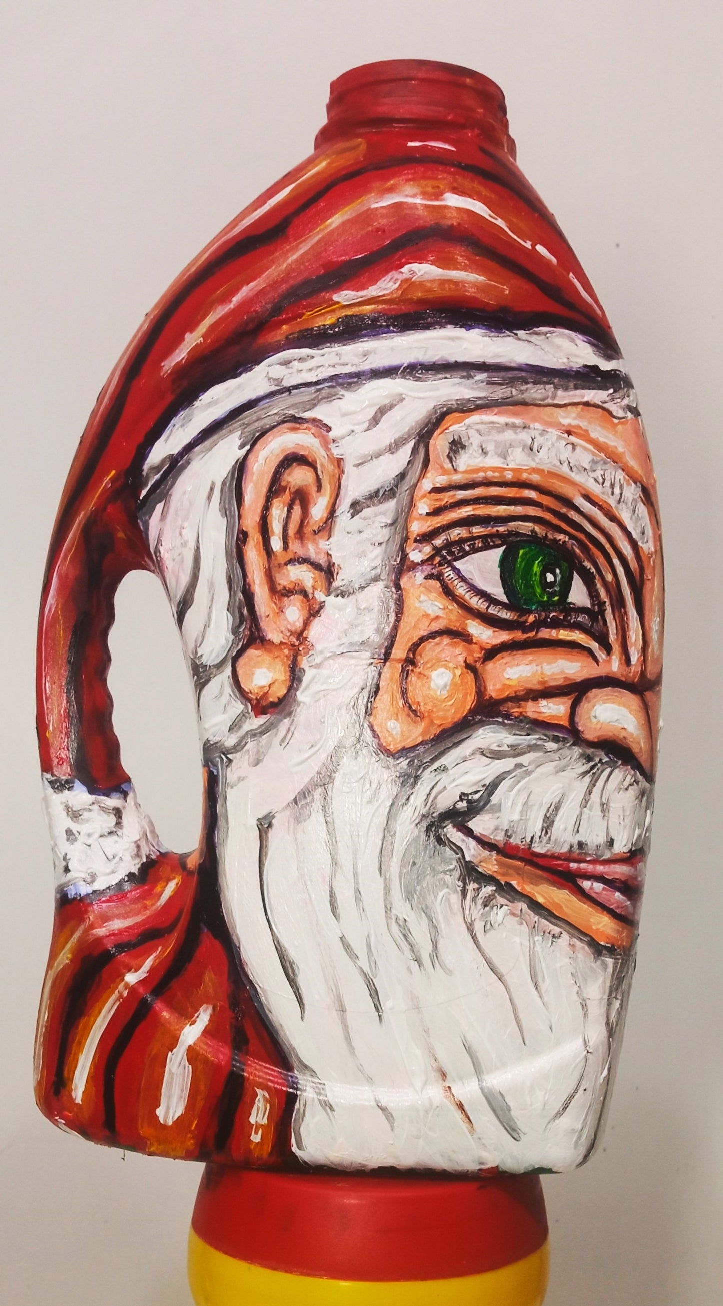 Mixed Race  Santa Claus Figurine Created out of Recycle Plastic Bottle . [Recycled Art]. Ivan Fyodorovich. White side