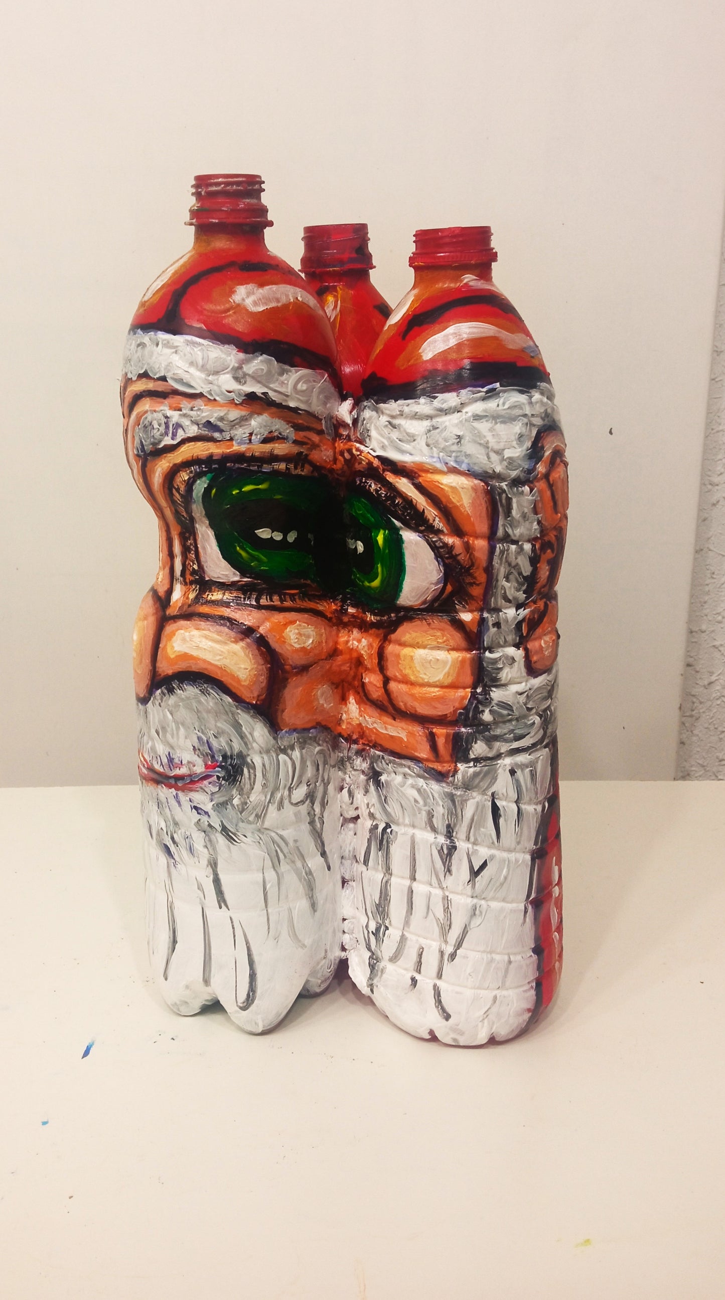 Santa Claus Christmas Figurine Created out of Three Recycled  Plastic Bottles . [Recycled Art]. Ivan Fyodorovich. left lateral view