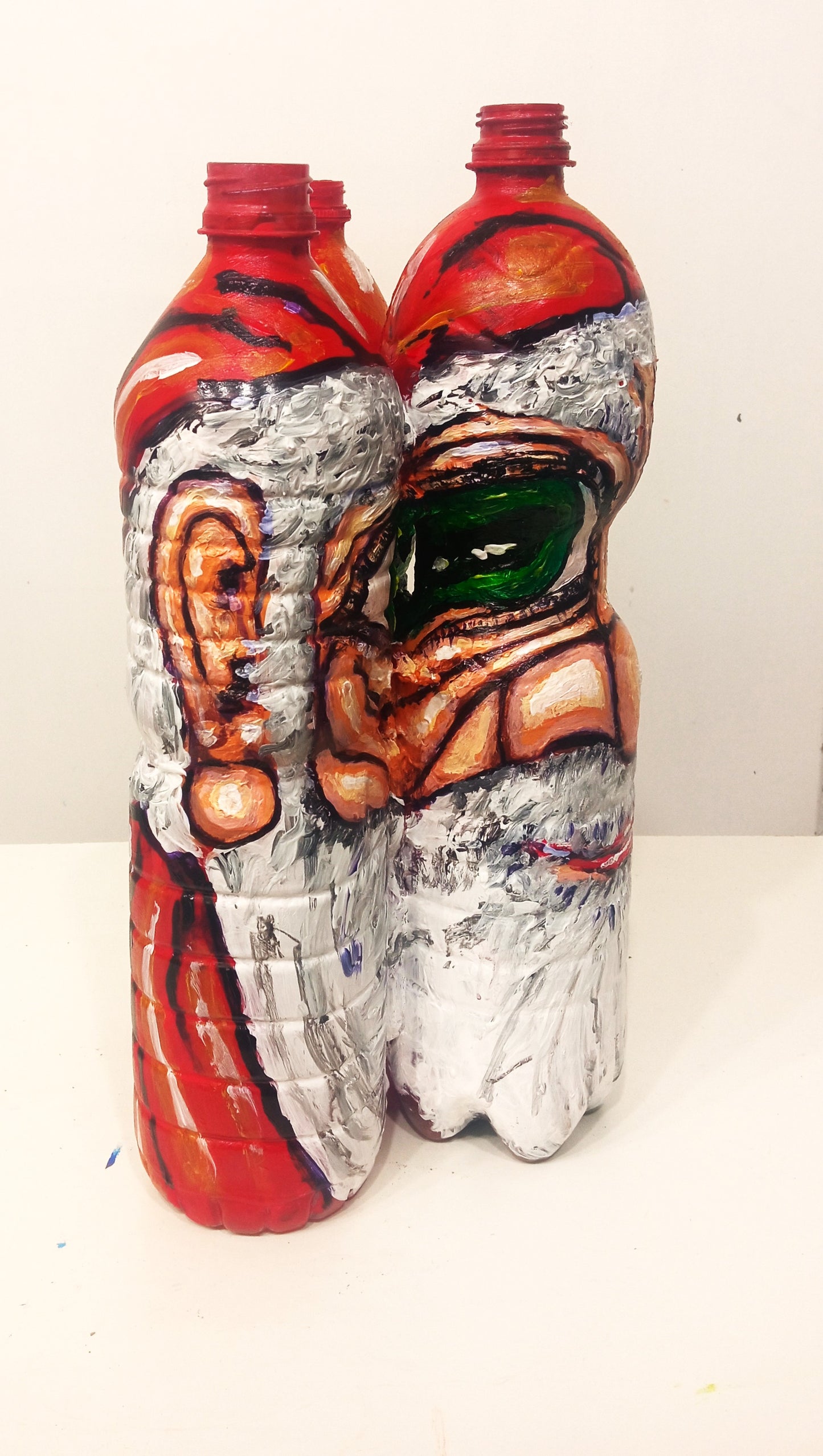 Santa Claus Christmas Figurine Created out of Three Recycled  Plastic Bottles . [Recycled Art]. Ivan Fyodorovich. right lateral view