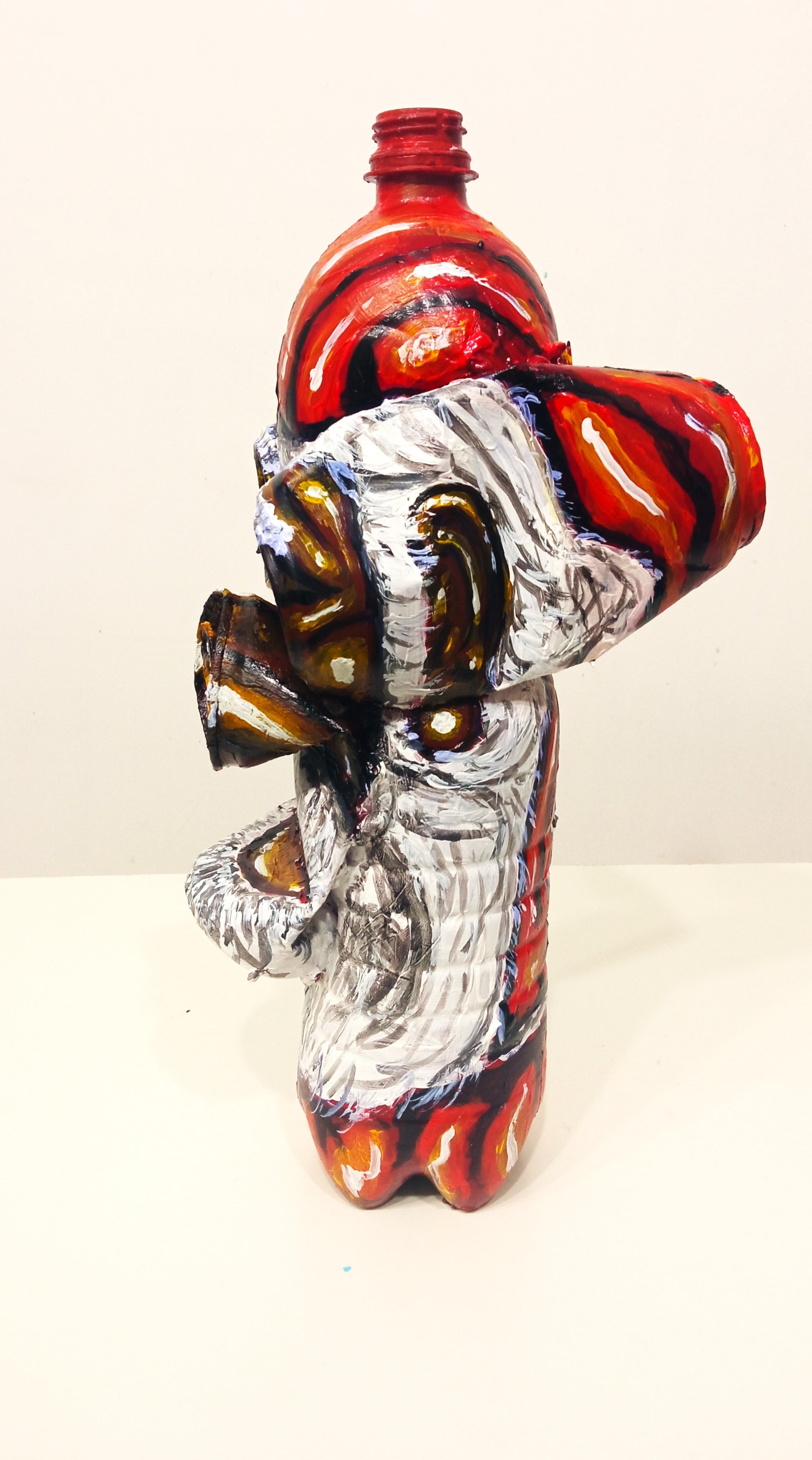 Black Santa Claus  Created out of Recycled Plastic Bottles and Beer Cans .[Recycled Art]. Ivan Fyodorovich. Right lateral view