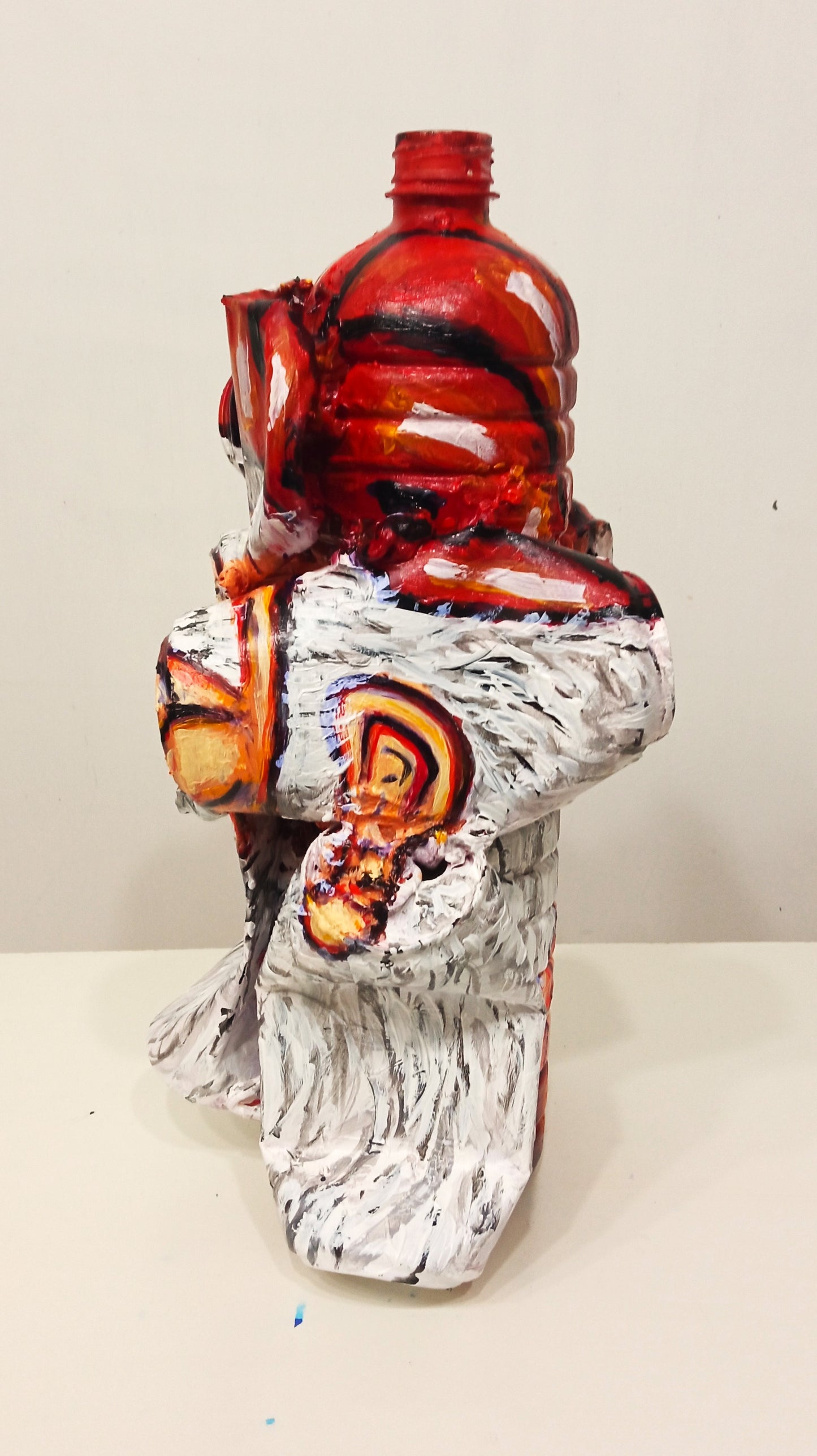 Smilely Santa Claus Christmas Figurine Created out of  Recycled  Plastic Bottles and Soda Cans . [Recycled Art]. Ivan Fyodorovich. Left lateral view