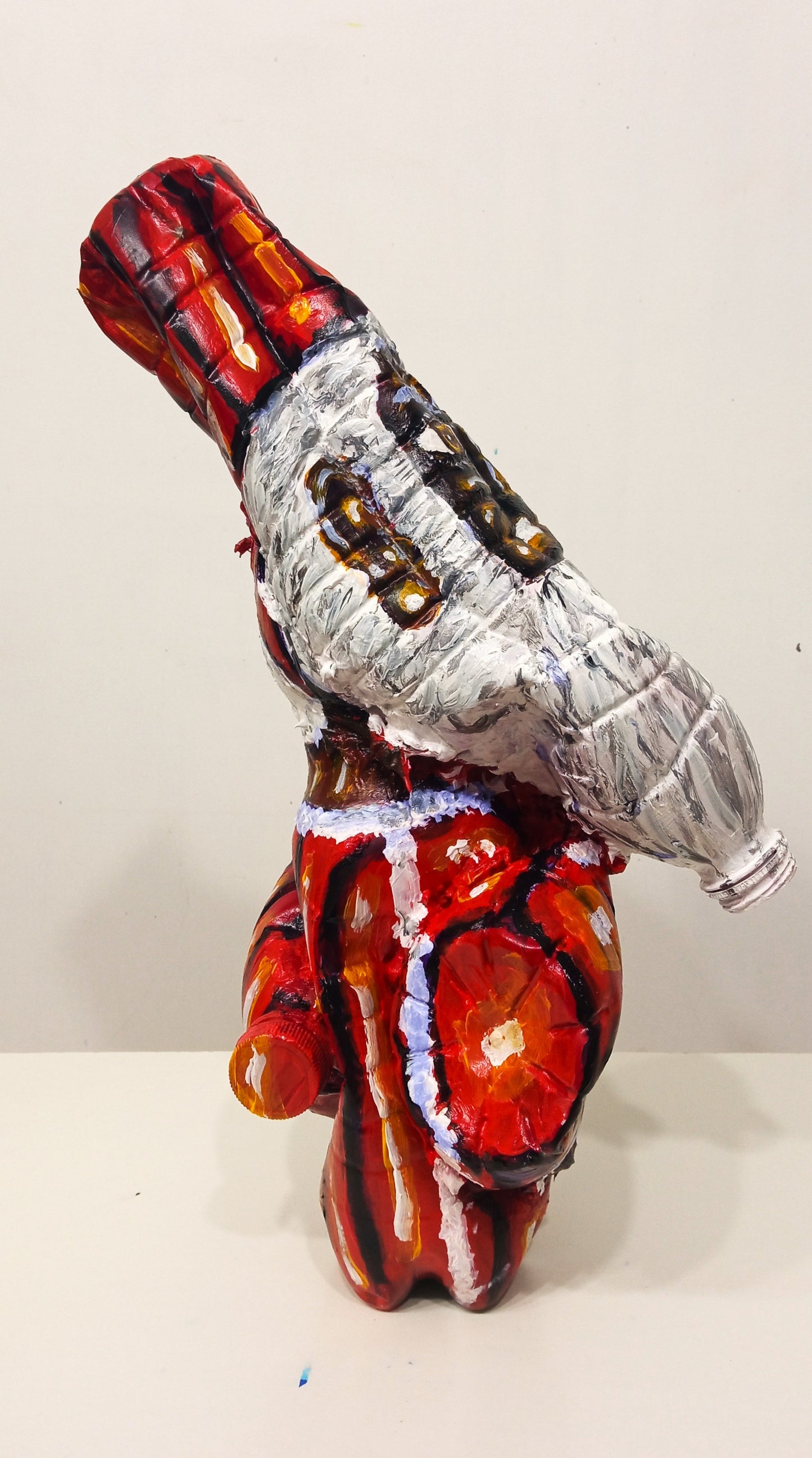 Tall Black Santa Claus Figurine Created out of Recycled  Plastic Bottles. [Recycled Art]. Ivan Fyodorovich. left side view