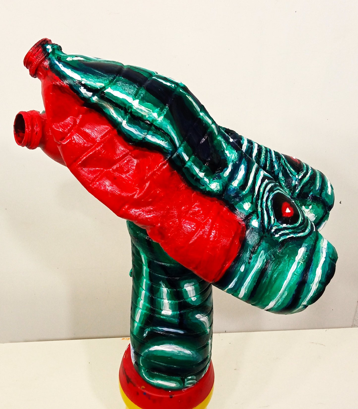 Chinese New Year Green Rabbit Figurine Made out of Recycled Plastic Bottles.[Recycled Art]. Ivan Fyodorovich. Lateral right view