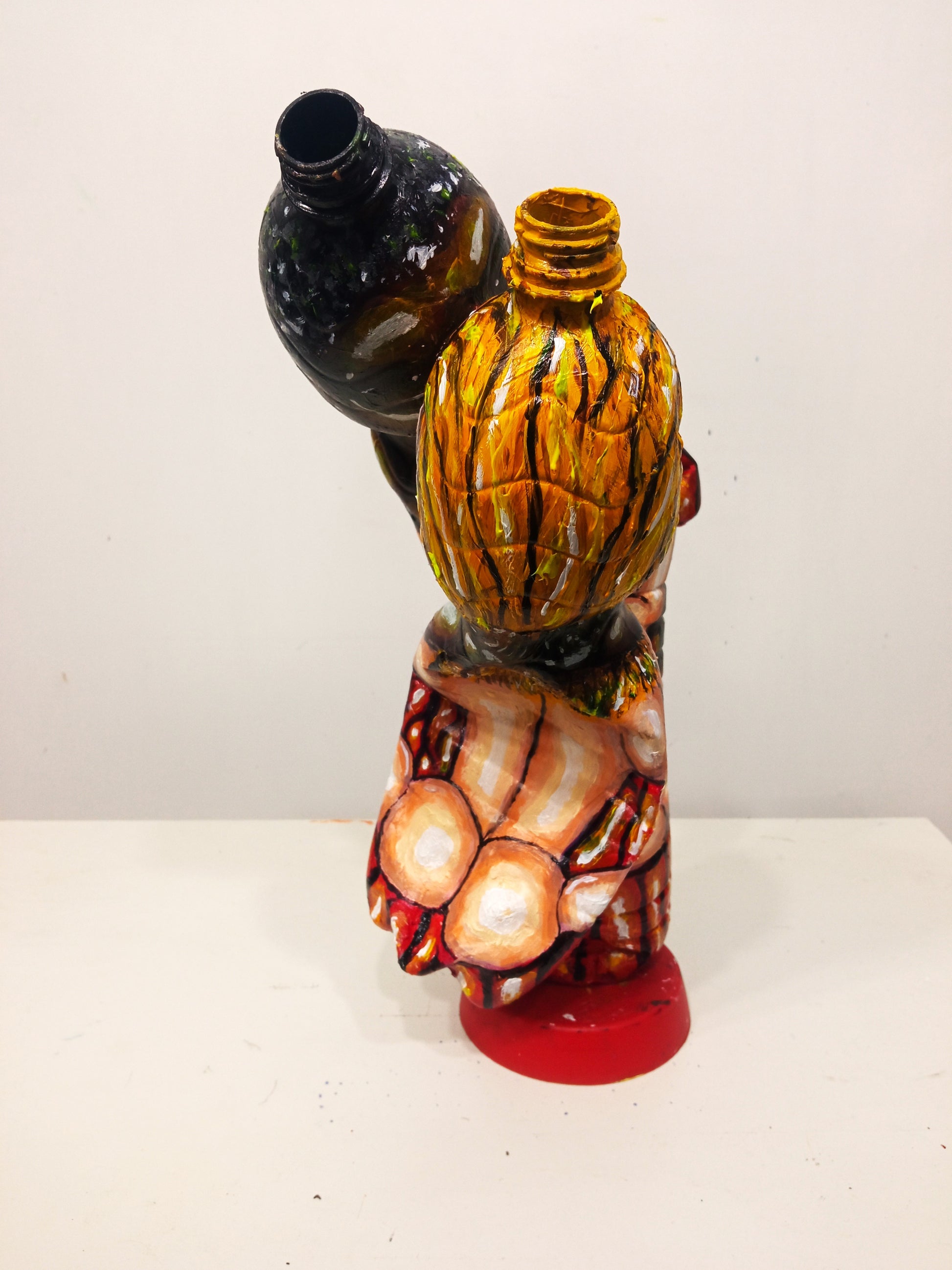 Mixed Race Couple Kissing Figurine Made out of Recycled Plastic Bottles.[Recycled Art].Backside view