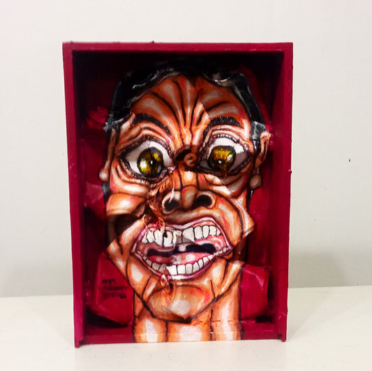 3D Streetart expressionistic style portrait painting.Anguished man with panic attack portrait. Acrylic on Wood box and Recycled beer Cans. [Recycled Art]. Front view