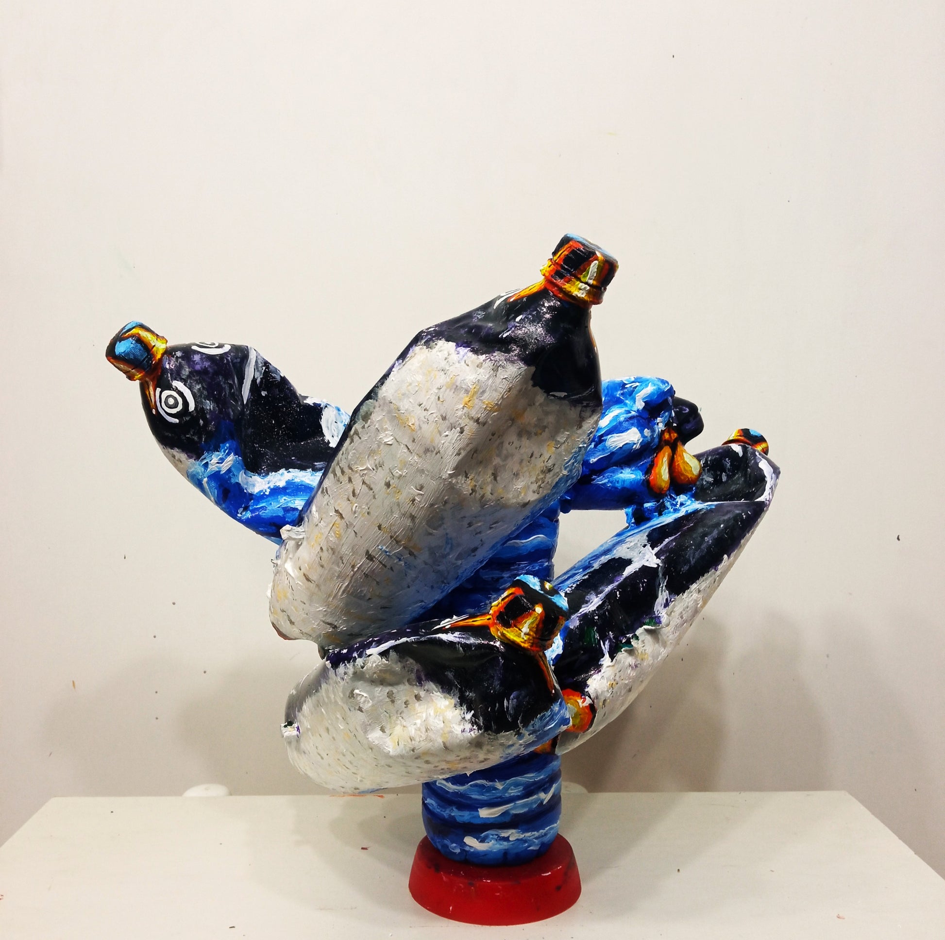 Penguins Swimmimg Vase for Dried Flowers Created out of a Recycled plastic bottle . [Recycled Art]. Ivan Fyodorovich