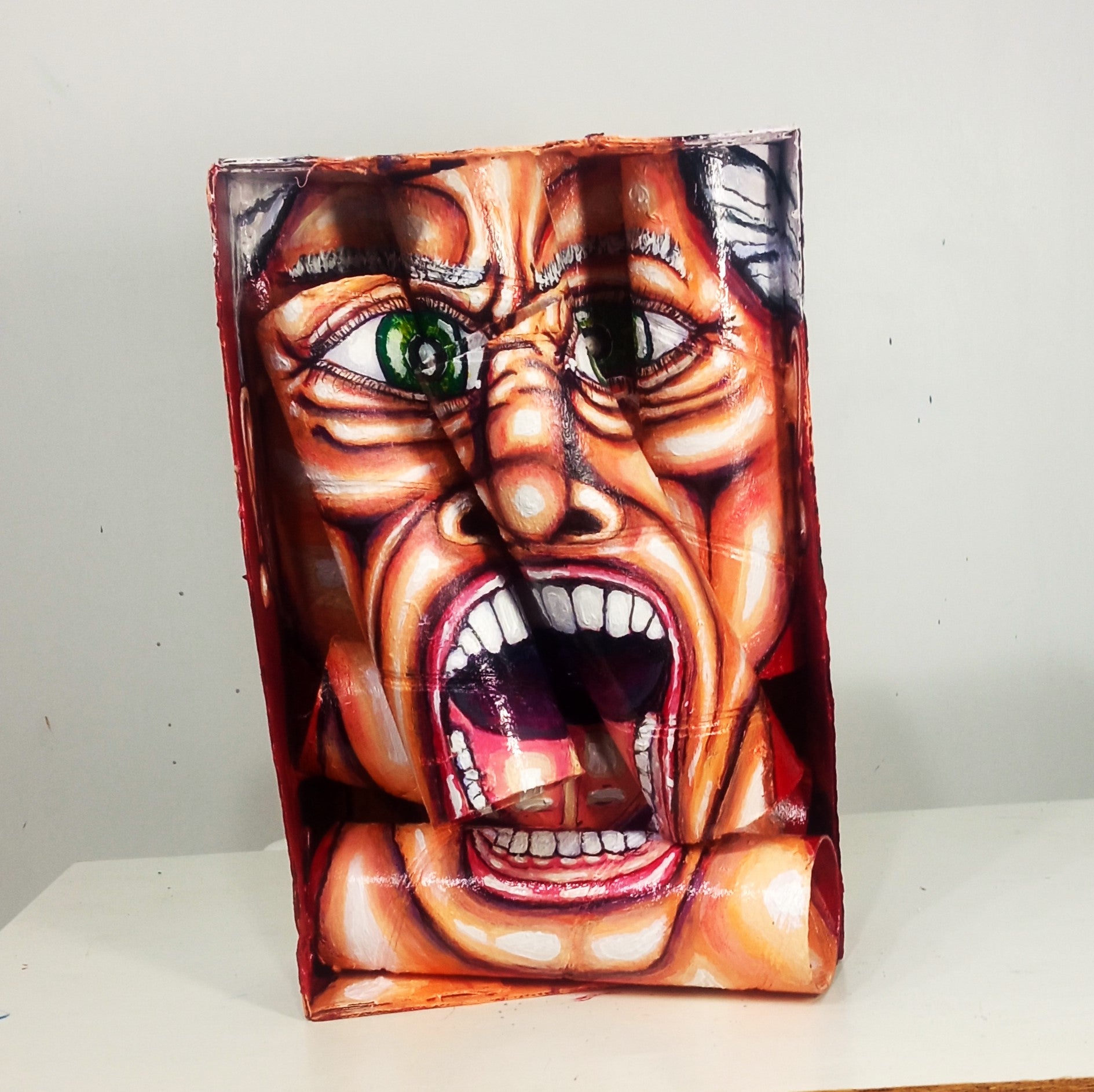 3D Portrait of a Man full of hatred. Acrylic on Recycled cardboard Tubes.  [Recycled Art].Front View