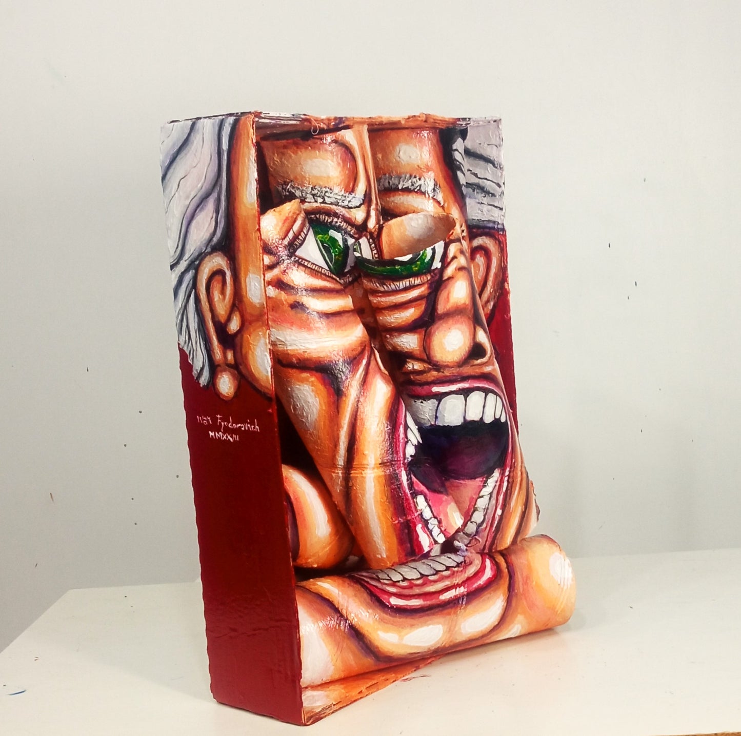 3D Portrait of a Man full of hatred. Acrylic on Recycled cardboard Tubes.  [Recycled Art]. medium  left lateral view