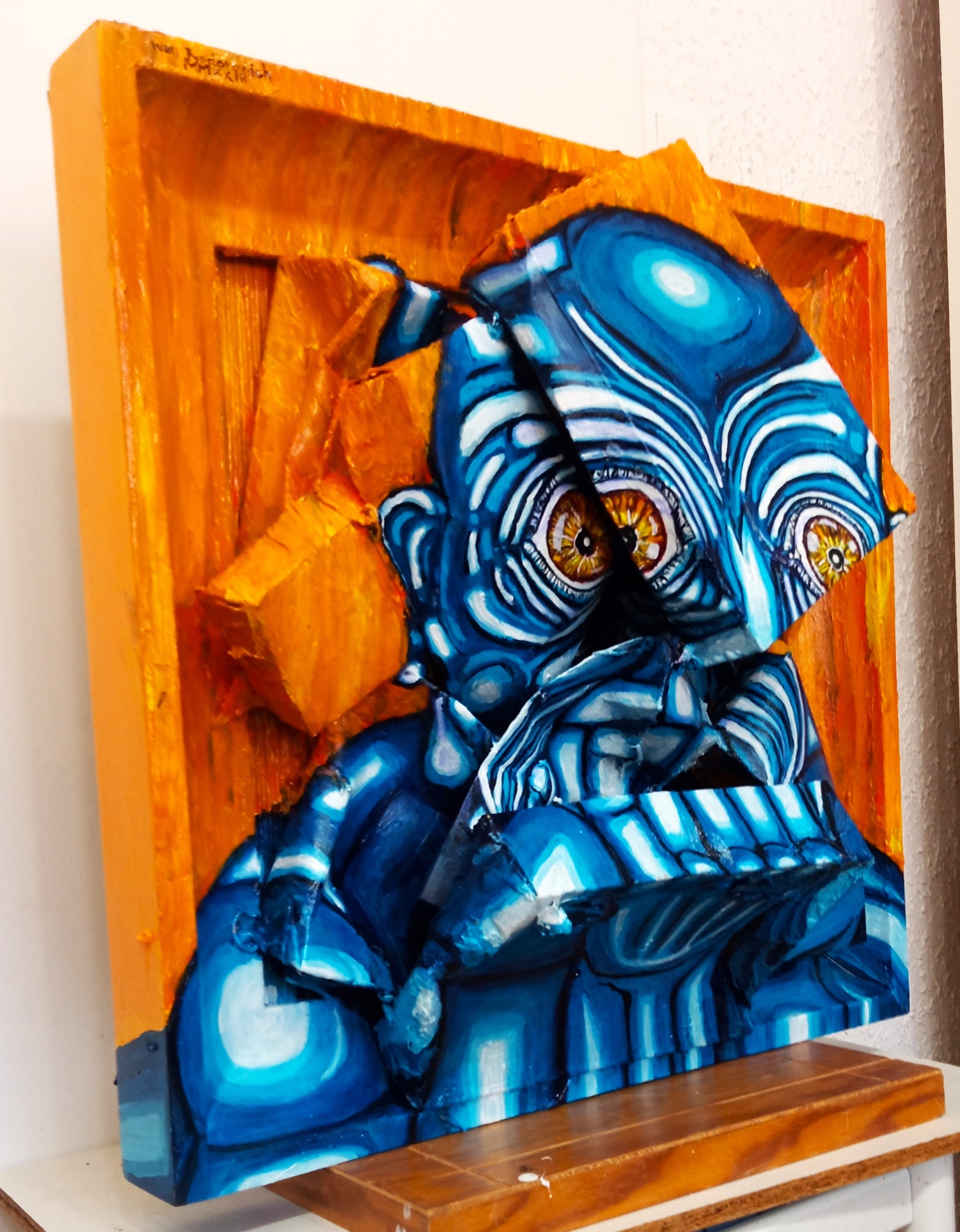 3D Portrait of a Lonely Blue Man. Acrylic on Woodboard and Recycled Cardboard Boxes. (Mental Health Issues Art) [Recycled Art]. Medium Left Lateral View