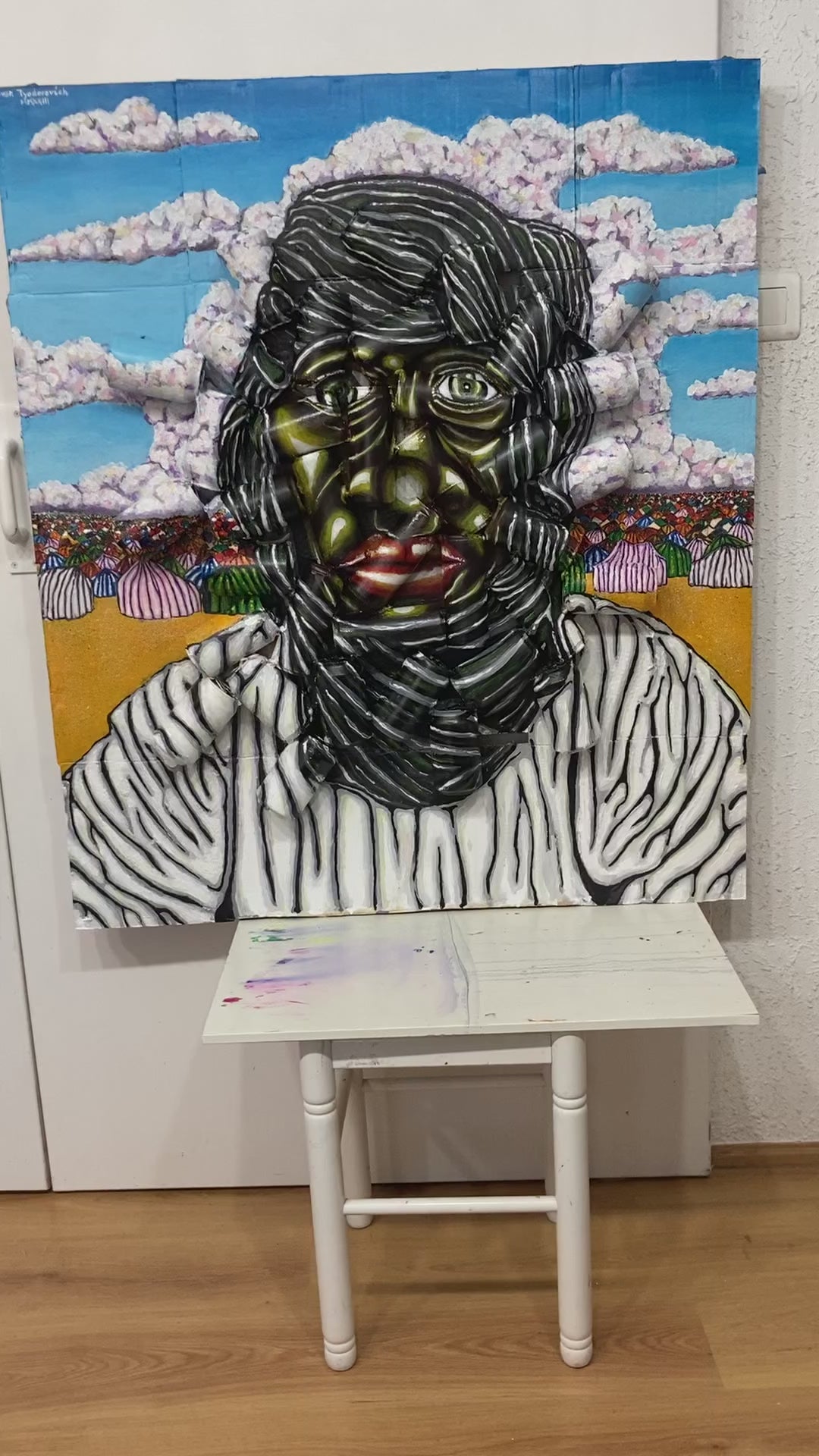 3D Portrait of a Sahrawy Refugee in front of a Tent Camp. Acrylic on Carboard and Recycled Beer Cans[Recycled Art]. Ivan Fyodorovich. Video