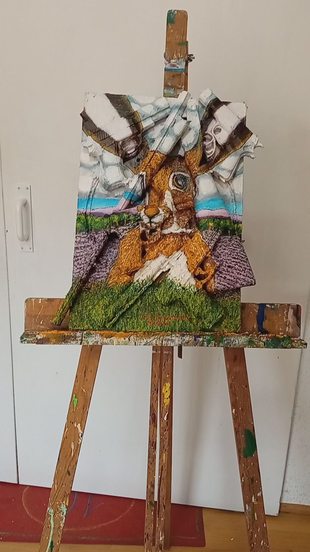 [The Hare Prevails], 3D portrait of a Hare in nature. Acrylic on woodboard and toy guns and pistols (Recycled Art). Video