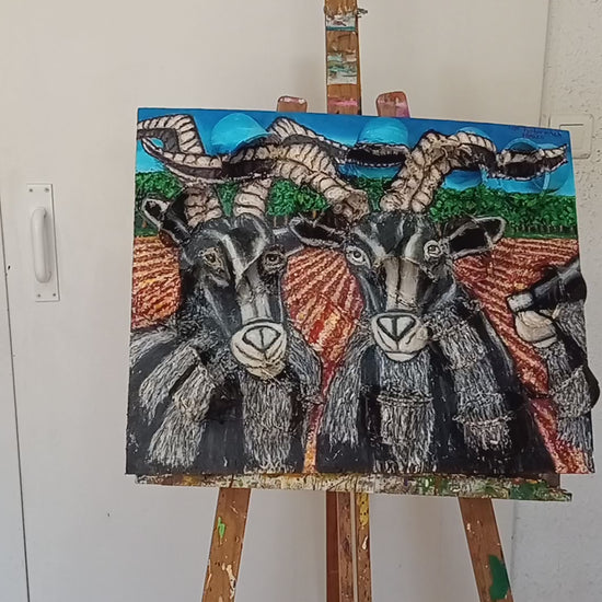 3D portrait of three male goats in a field with a pinetree forest in the background. Acrylic paint on woodboard and recycled plastic rice containers.[Recycled Art]. Video